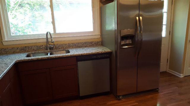 457 Galahad Road Bolingbrook, IL 60440 - Photo 5 of 14 a bathroom with a sink and a mirror