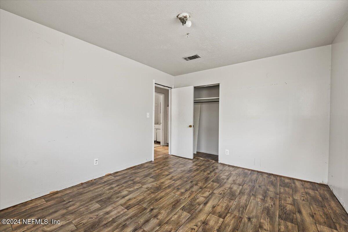 8988 Castle Boulevard Jacksonville, FL 32208 - Photo 17 of 28 a view of an empty room