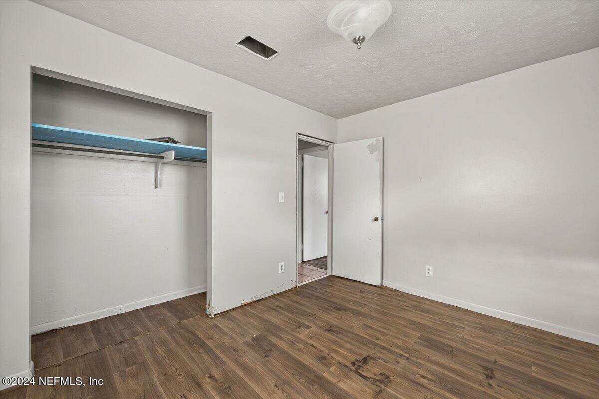 8988 Castle Boulevard Jacksonville, FL 32208 - Photo 21 of 28 a view of an empty room