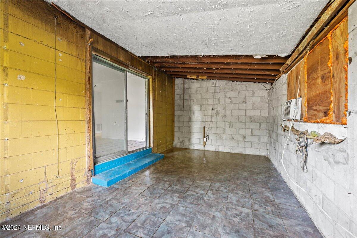 8988 Castle Boulevard Jacksonville, FL 32208 - Photo 23 of 28 a view of an empty room