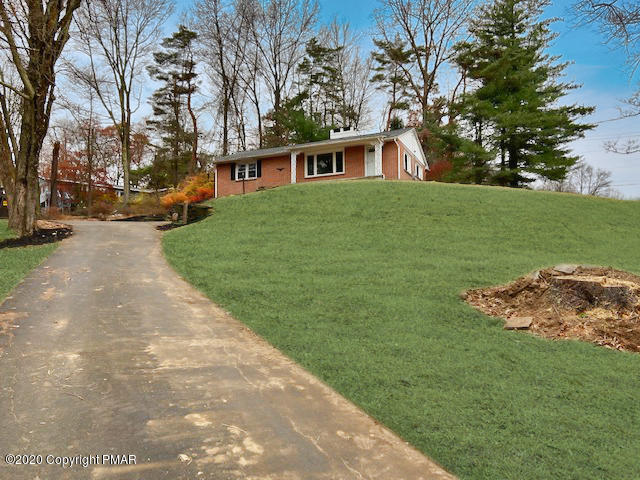 7522 Old Coach Road Stroudsburg, PA 18360 - Photo 14 of 68 a view of a house with a yard