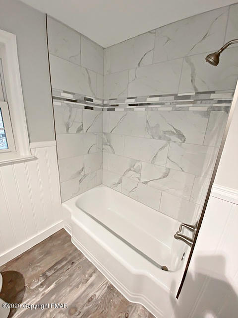 7522 Old Coach Road Stroudsburg, PA 18360 - Photo 44 of 68 a bathroom with a bathtub and a shower
