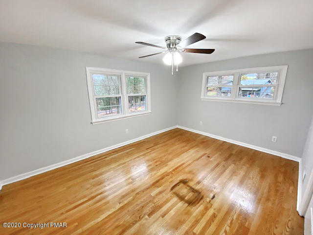 7522 Old Coach Road Stroudsburg, PA 18360 - Photo 51 of 68 a view of empty room with wooden floor