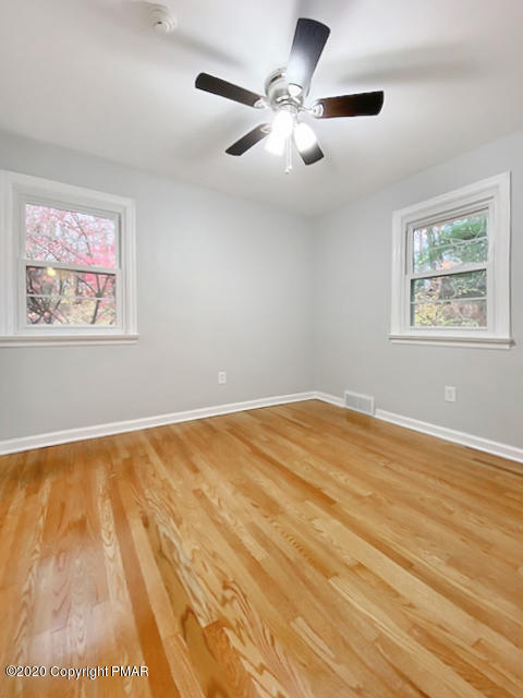 7522 Old Coach Road Stroudsburg, PA 18360 - Photo 61 of 68 a view of empty room with wooden floor