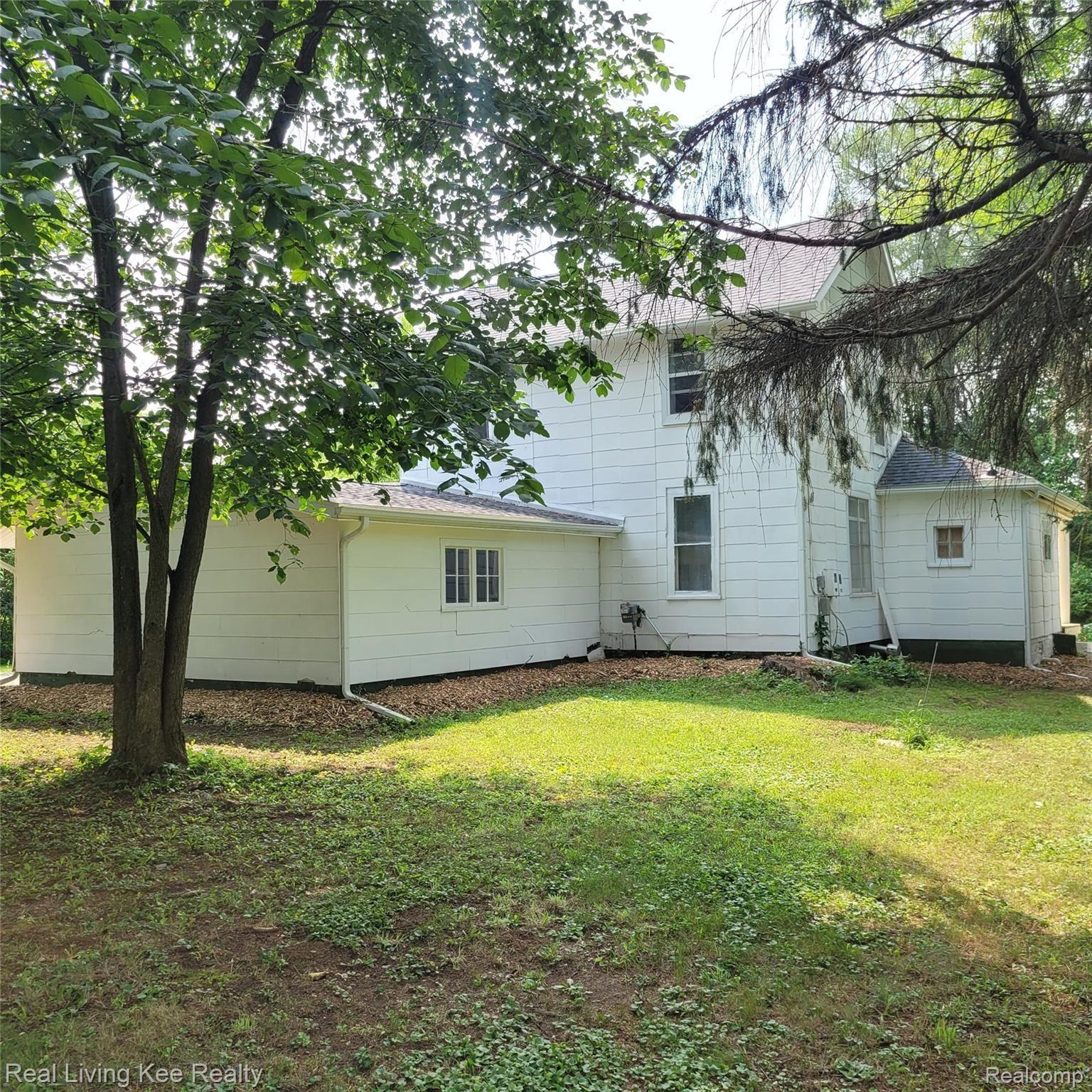 1866 Peppermill Road Lapeer, MI 48446 - Photo 24 of 33 Side Back.jpg