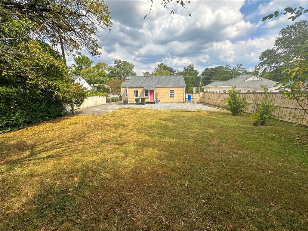 4154 Clairmont Road Chamblee, GA 30341 - Photo 4 of 9 a front view of a house with a yard