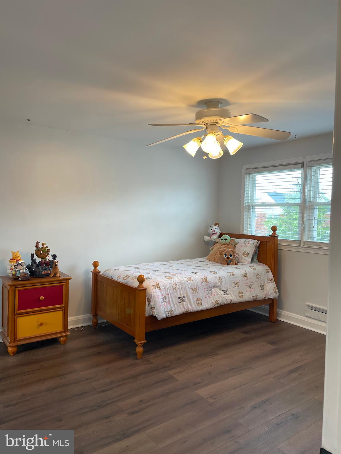 1407 Barrett Road Baltimore, MD 21207 - Photo 12 of 19 a bedroom with bed and window