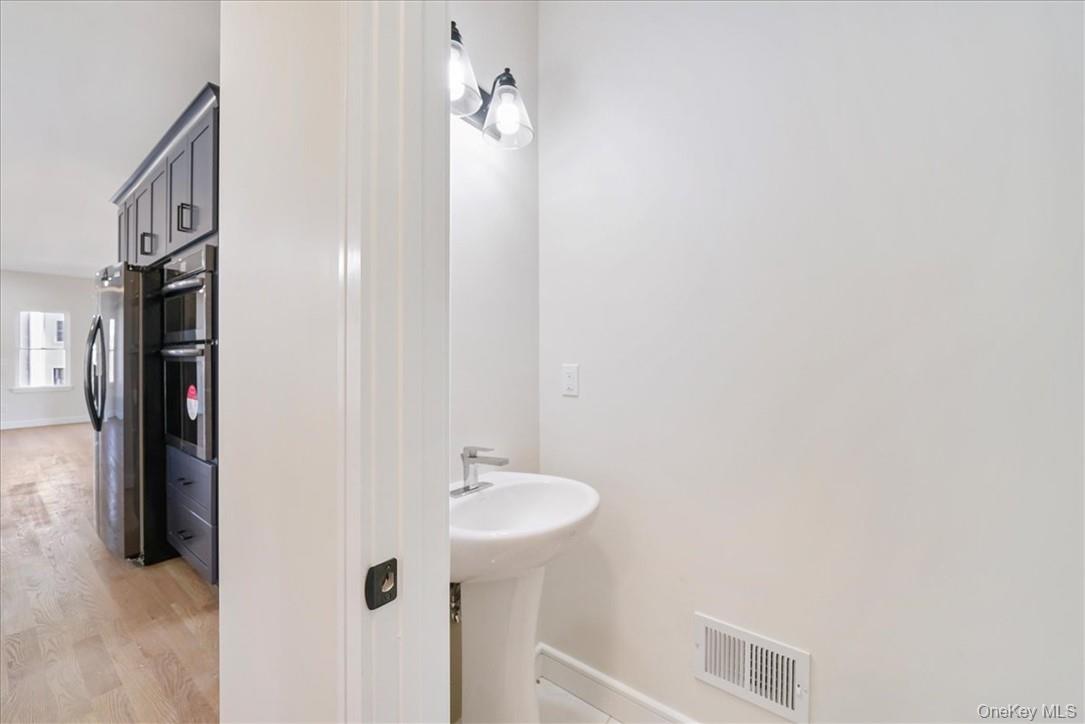 Lot 3-62 Camp Monroe Road Monroe, NY 10950 - Photo 15 of 39 Bathroom with hardwood / wood-style floors