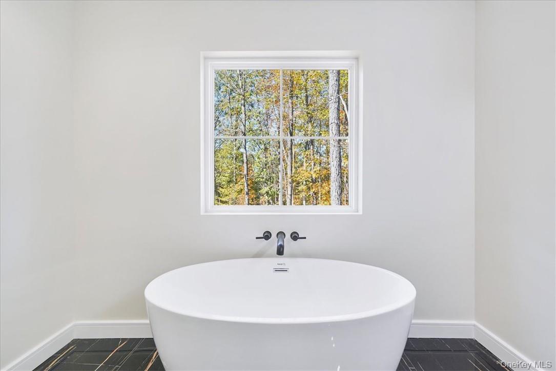 Lot 3-62 Camp Monroe Road Monroe, NY 10950 - Photo 25 of 39 Bathroom with a washtub