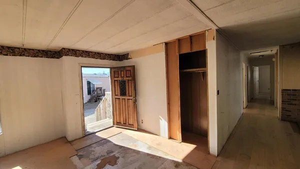 an empty room with windows