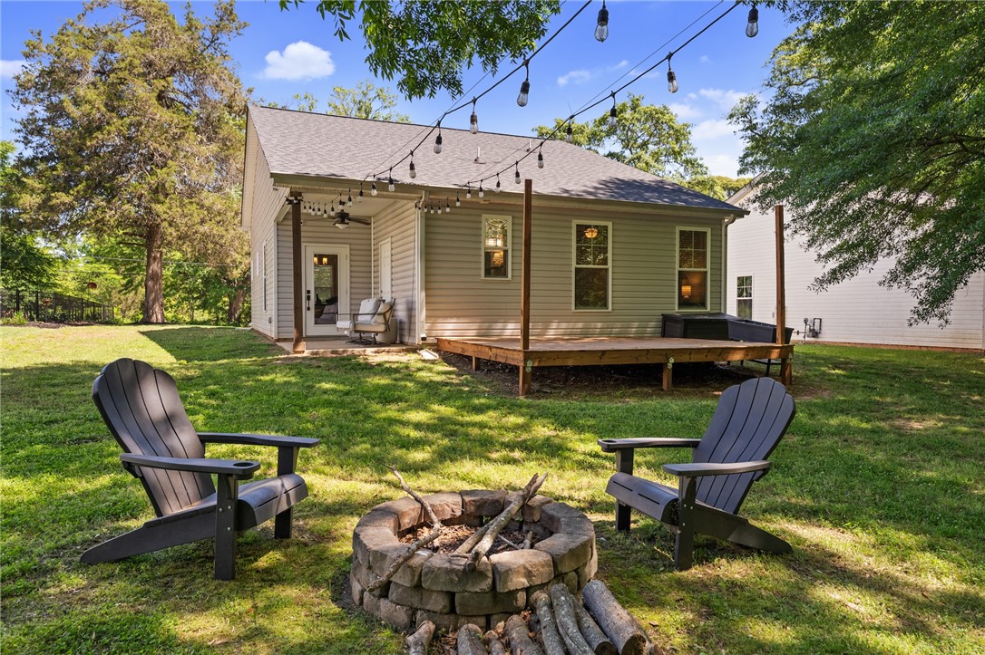 47 A Main Street Pelzer, SC 29669 - Photo 27 of 27 This inviting backyard oasis offers a perfect setting for outdoor enjoyment.