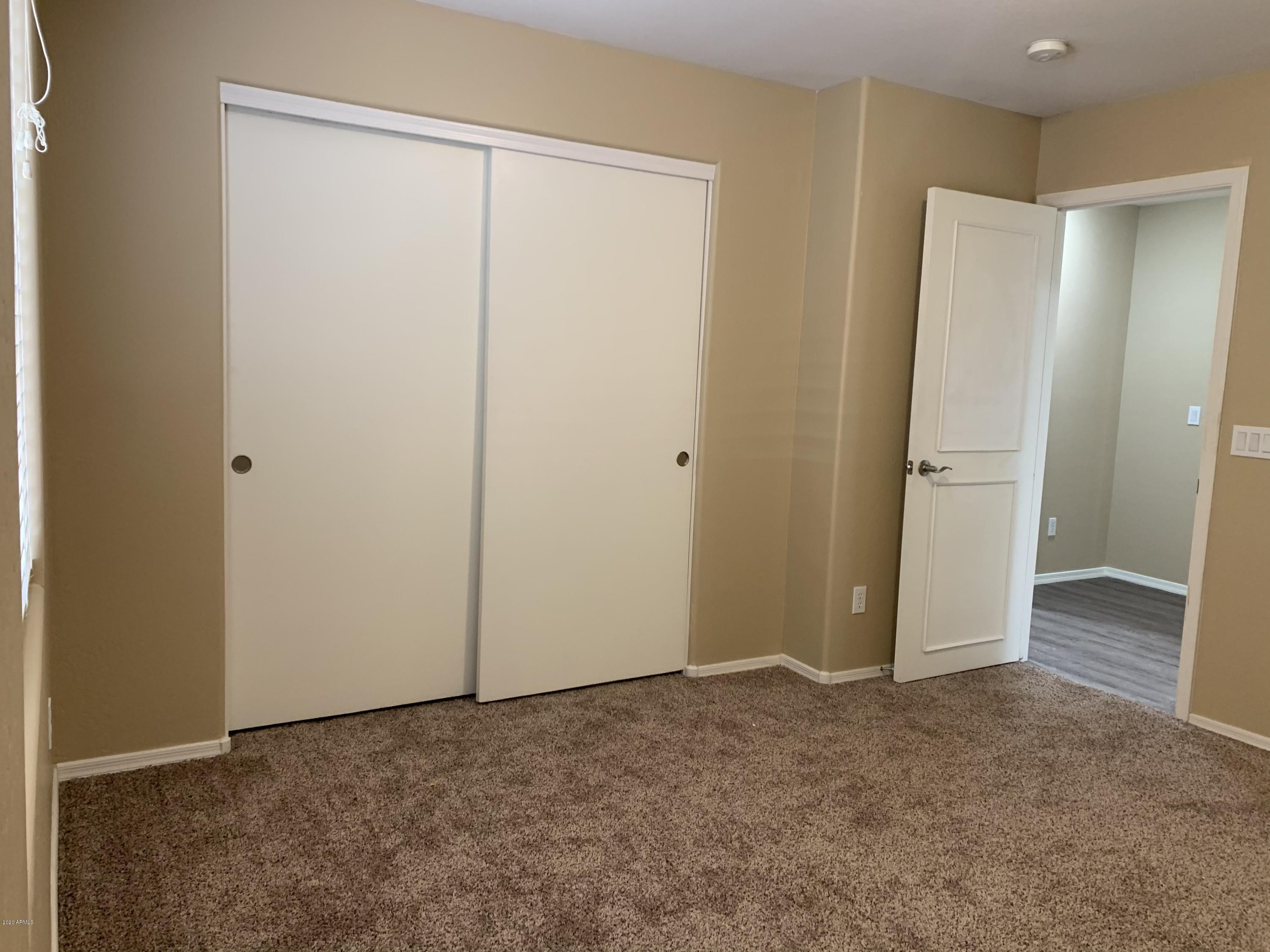 2306 West Maldonado Road Phoenix, AZ 85041 - Photo 10 of 14 a view of an empty room