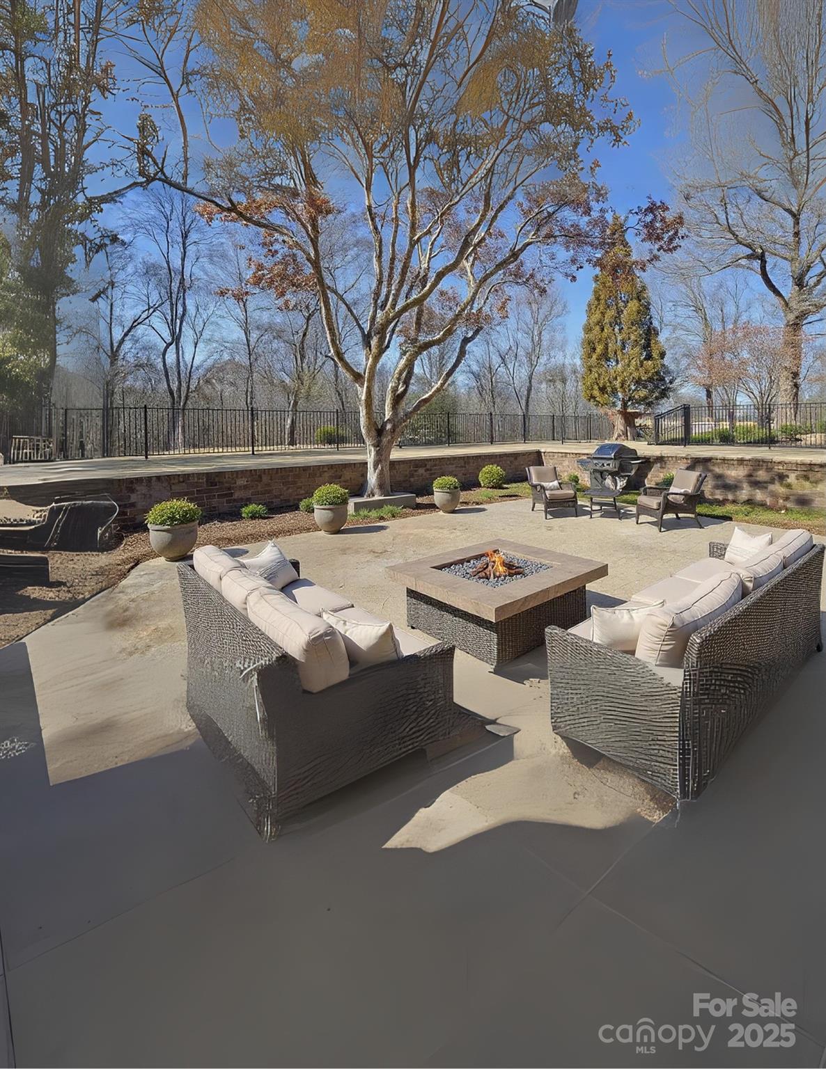 6615 Love Mill Road Monroe, NC 28110 - Photo 17 of 37 a view of a backyard with open kitchen