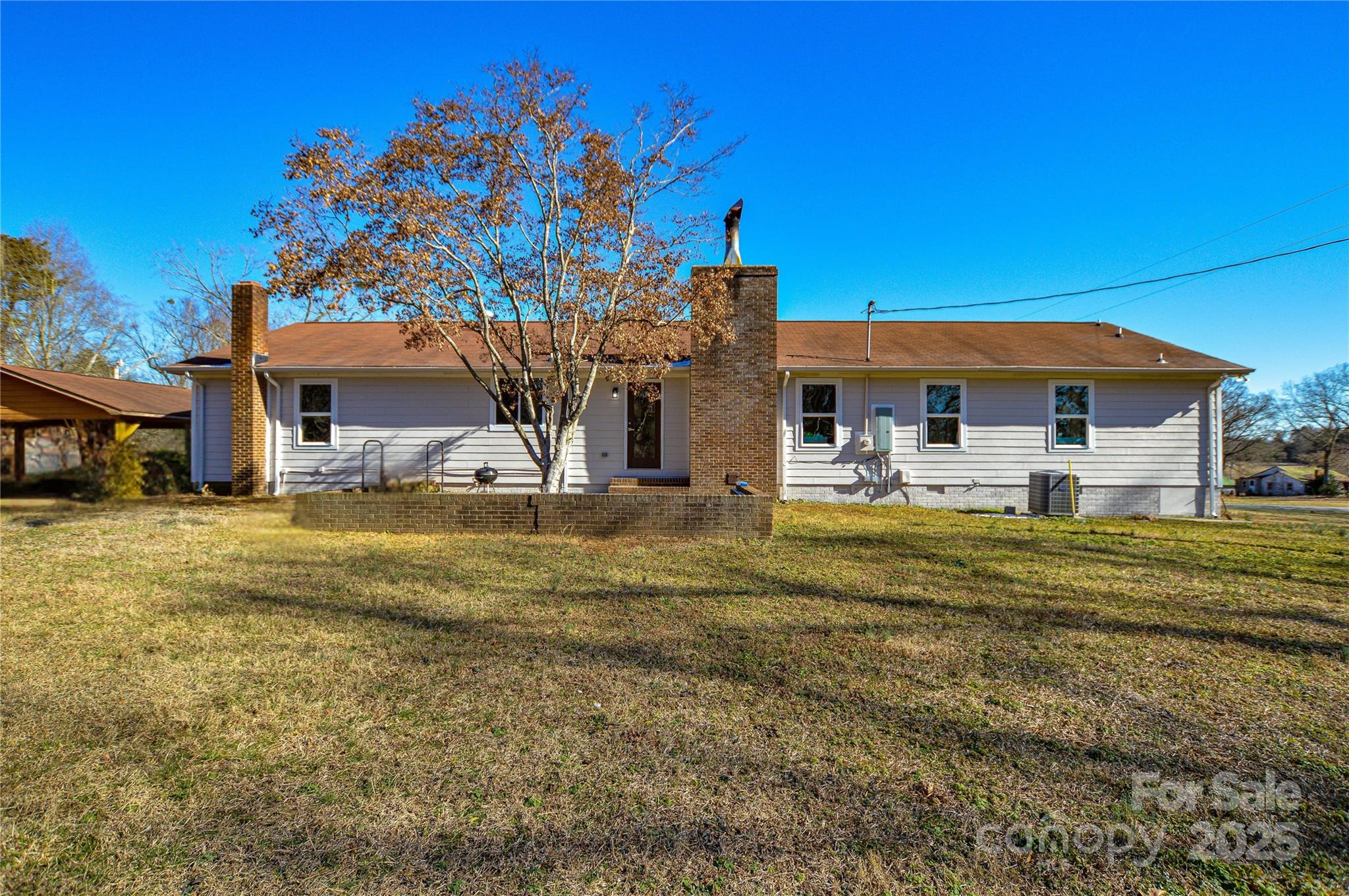 6615 Love Mill Road Monroe, NC 28110 - Photo 21 of 37 a front view of house with yard