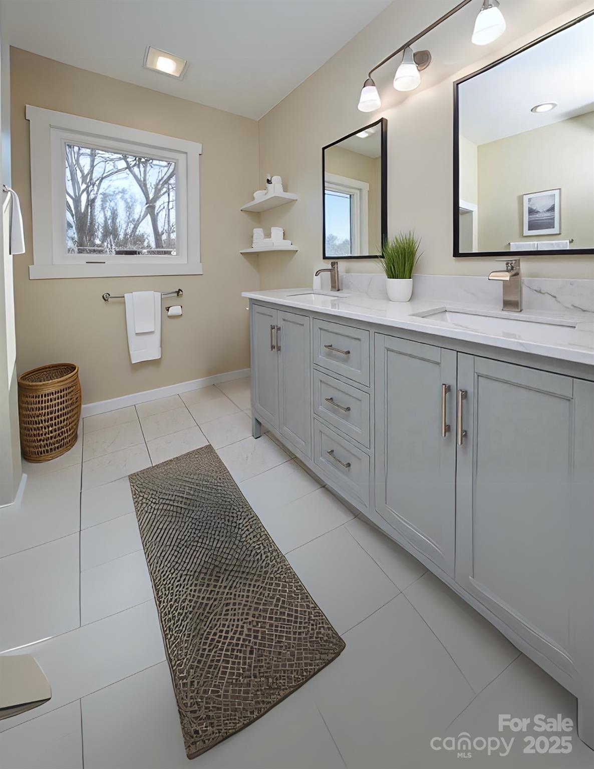 6615 Love Mill Road Monroe, NC 28110 - Photo 27 of 37 a spacious bathroom with a double vanity sink and a mirror
