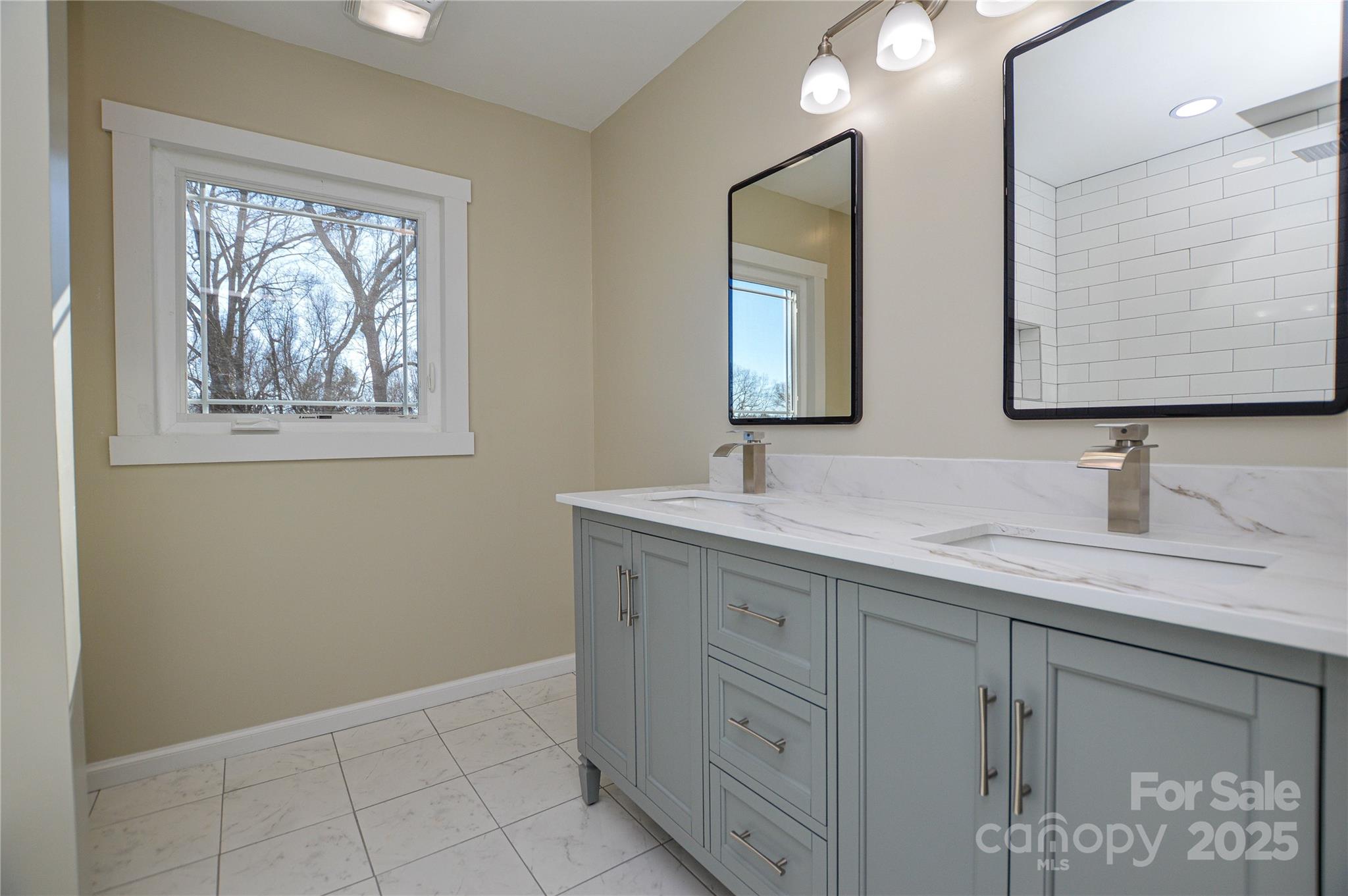 6615 Love Mill Road Monroe, NC 28110 - Photo 28 of 37 a bathroom with a granite countertop sink mirror and double