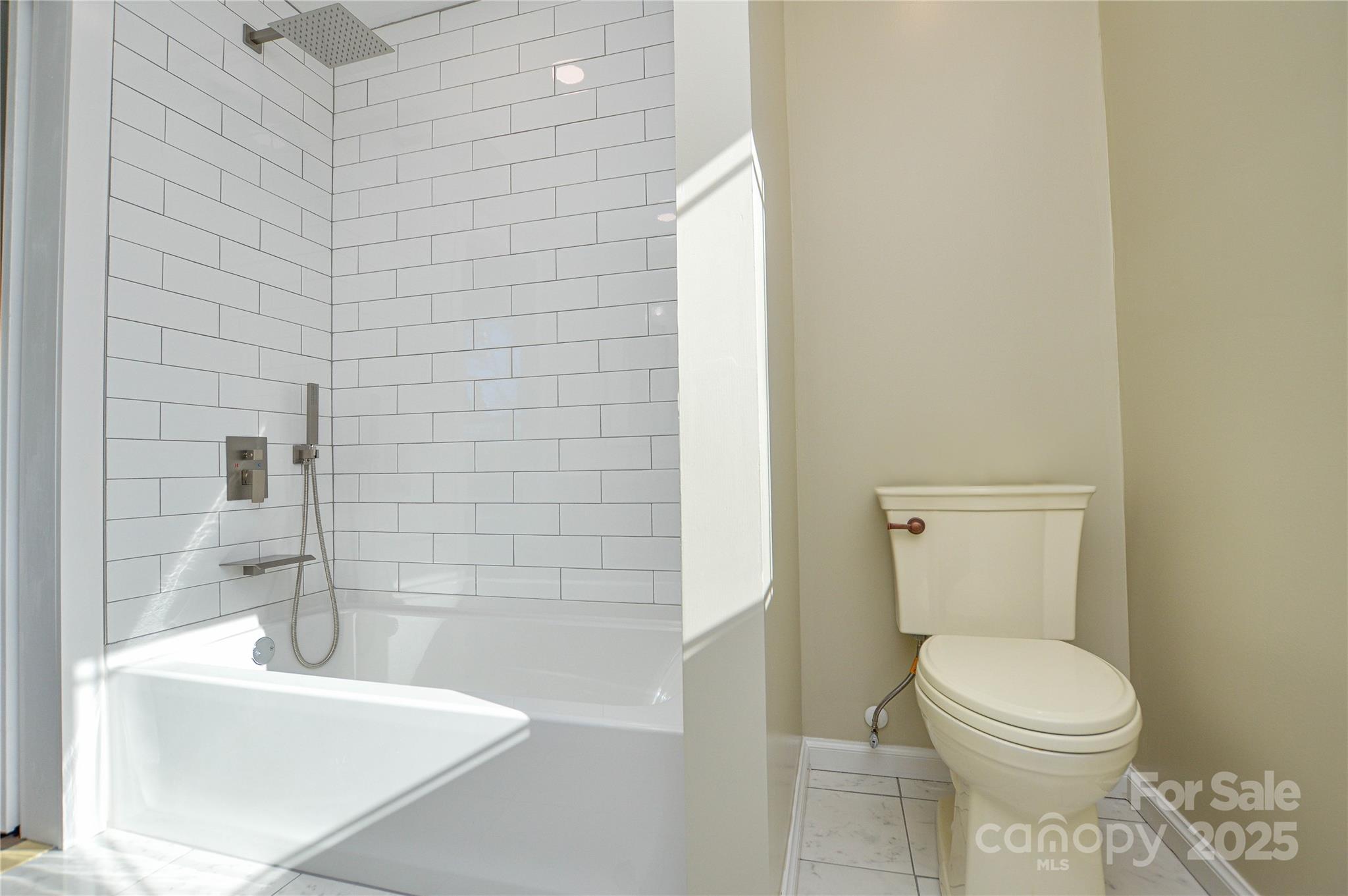 6615 Love Mill Road Monroe, NC 28110 - Photo 30 of 37 a bathroom with a toilet and a shower