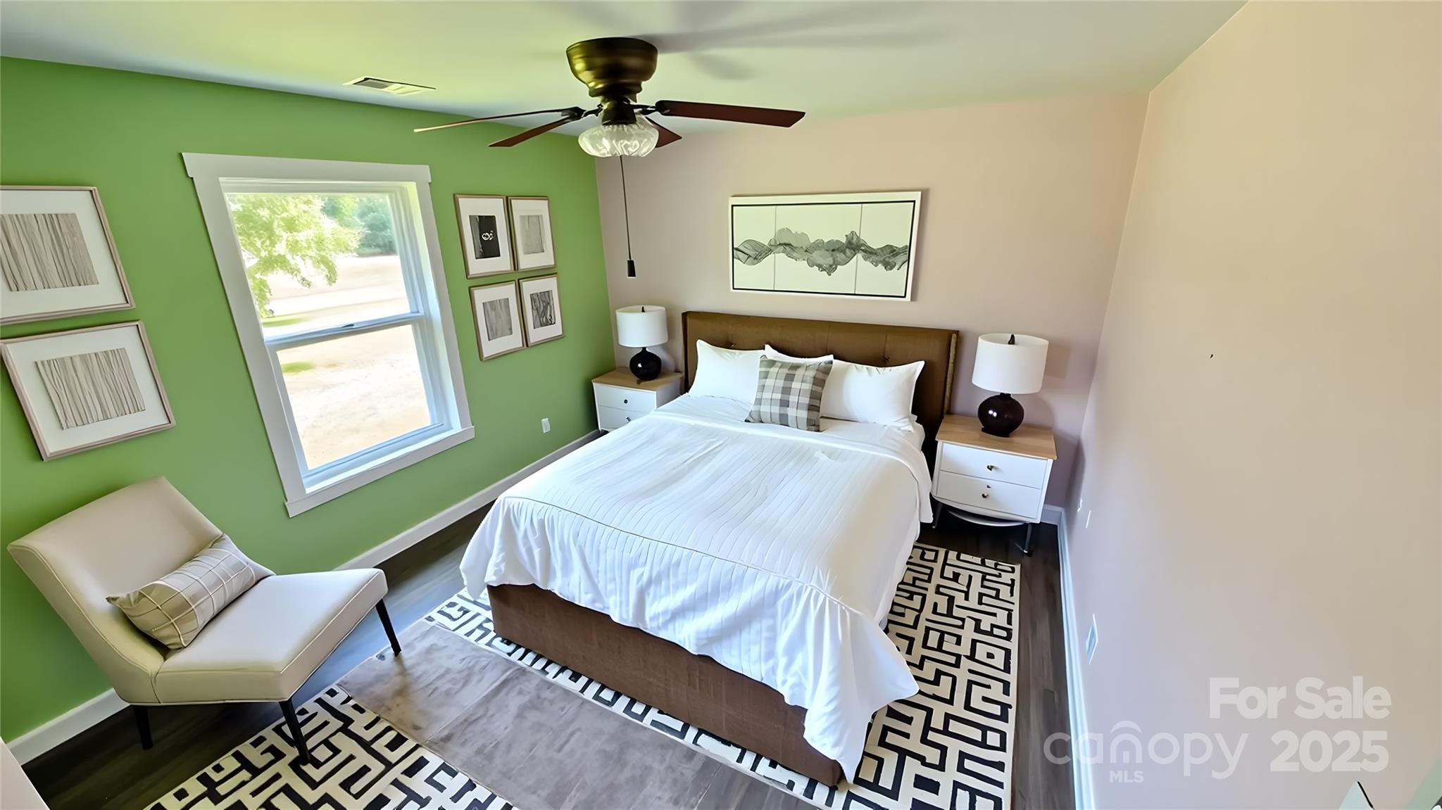 6615 Love Mill Road Monroe, NC 28110 - Photo 32 of 37 a bedroom with a bed and a couch