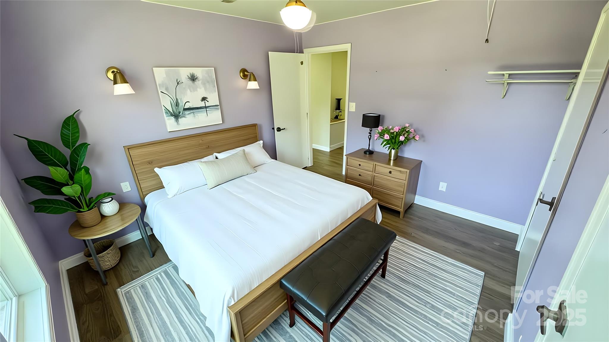 6615 Love Mill Road Monroe, NC 28110 - Photo 33 of 37 a bedroom with a bed potted plant with the outer view