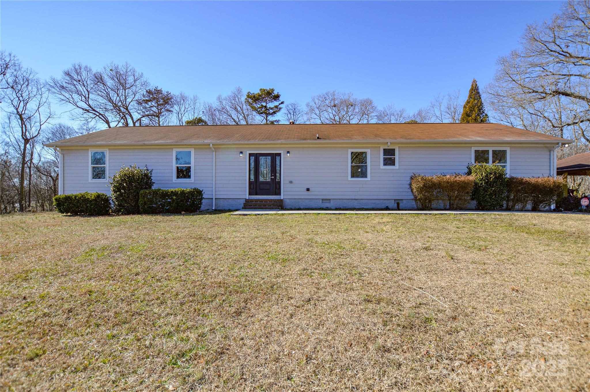 6615 Love Mill Road Monroe, NC 28110 - Photo 35 of 37 front view of a house with a yard