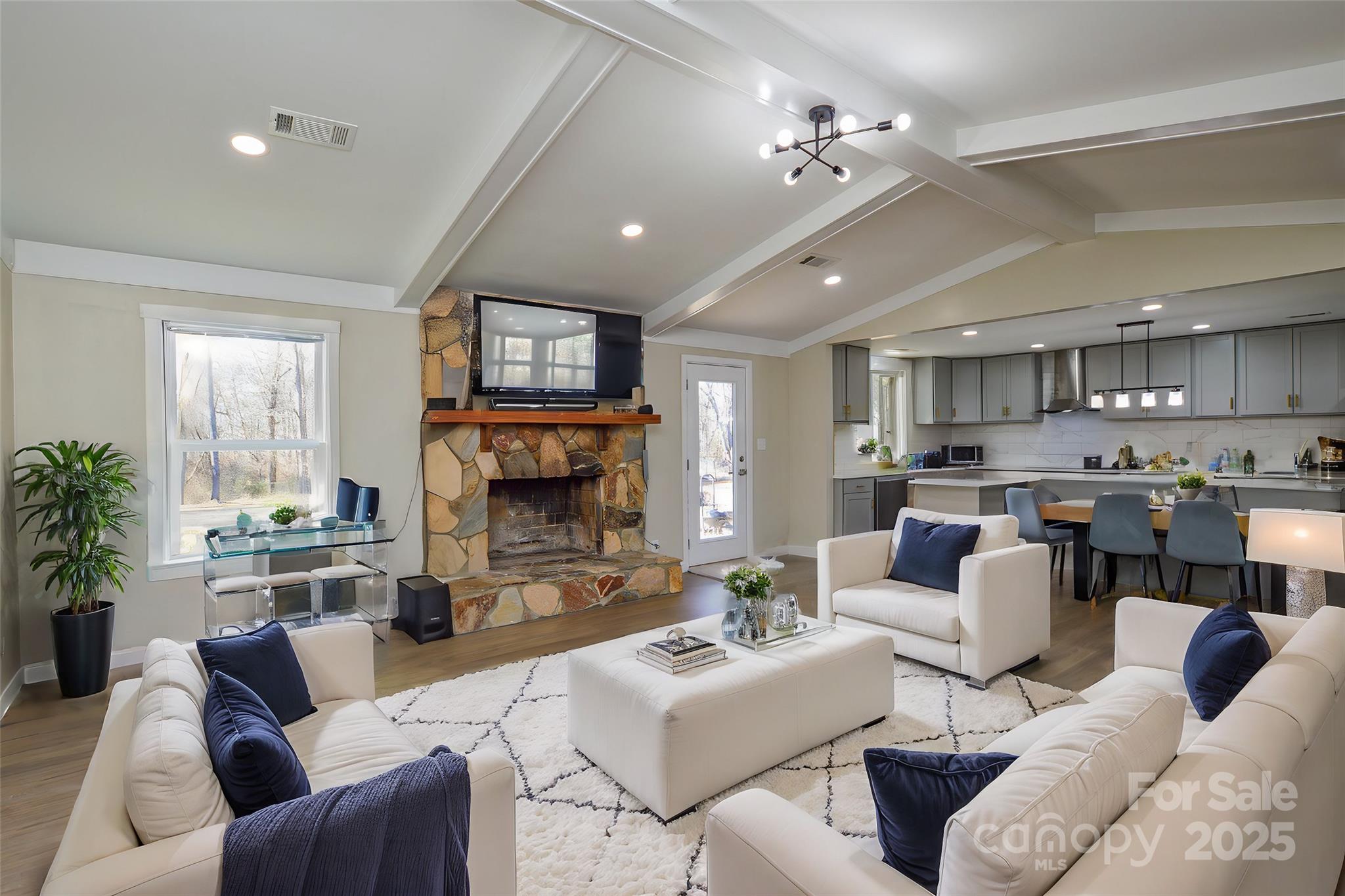 6615 Love Mill Road Monroe, NC 28110 - Photo 4 of 37 a living room with furniture kitchen view and a large window