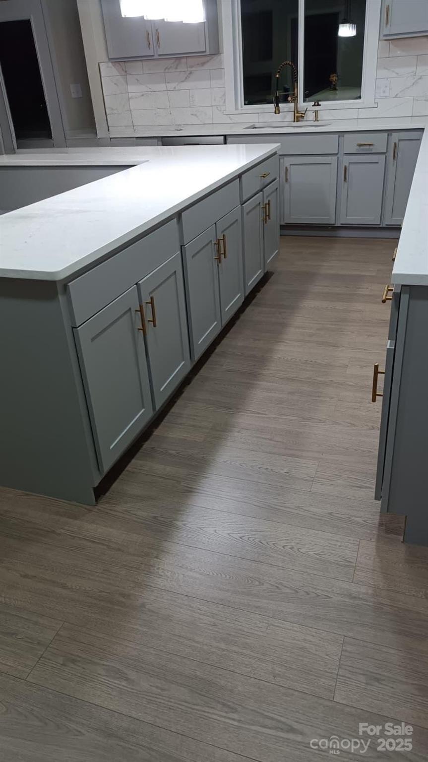 6615 Love Mill Road Monroe, NC 28110 - Photo 7 of 37 a bathroom with a double vanity sink a mirror and a bathtub