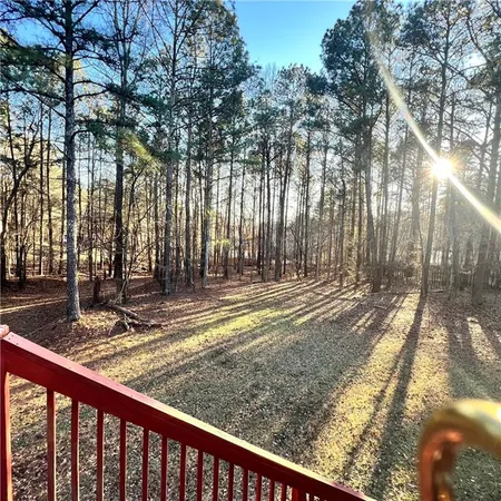 a view of backyard with green space
