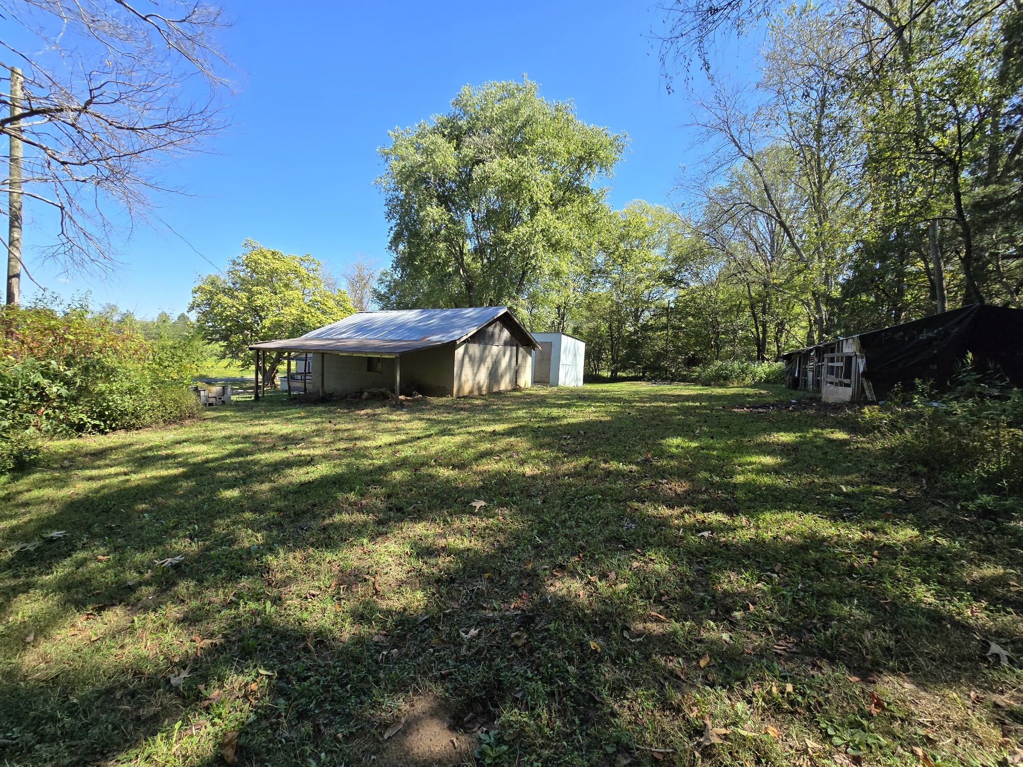 2606 Cave Springs Road Springfield, TN 37172 - Photo 3 of 27 a fire hydrant in the middle of a field