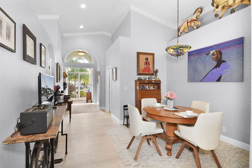 6848 Southeast Twin Oaks Circle Stuart, FL 34997 - Photo 19 of 70 a view of a livingroom and dining room