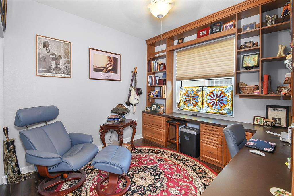 6848 Southeast Twin Oaks Circle Stuart, FL 34997 - Photo 30 of 70 a living room with furniture and a flat screen tv