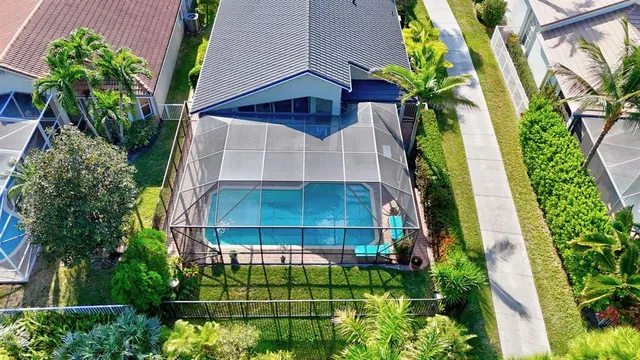 a view of a work space with furniture window and wooden floor