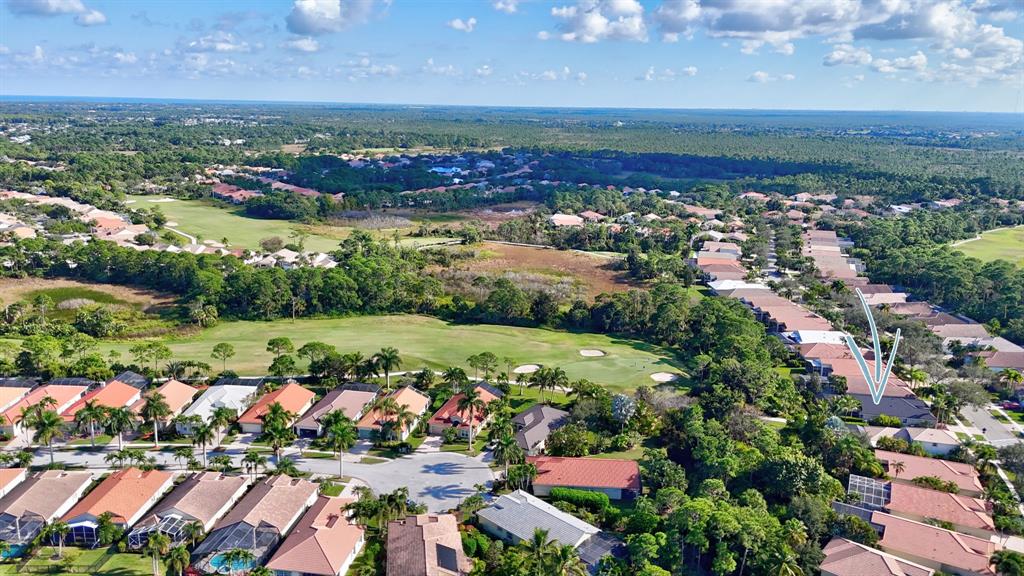 6848 Southeast Twin Oaks Circle Stuart, FL 34997 - Photo 52 of 70 an aerial view of a city