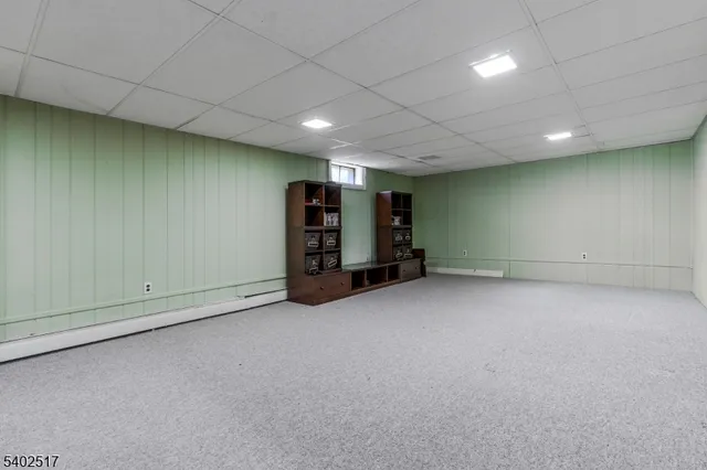 an empty room with furniture and closet