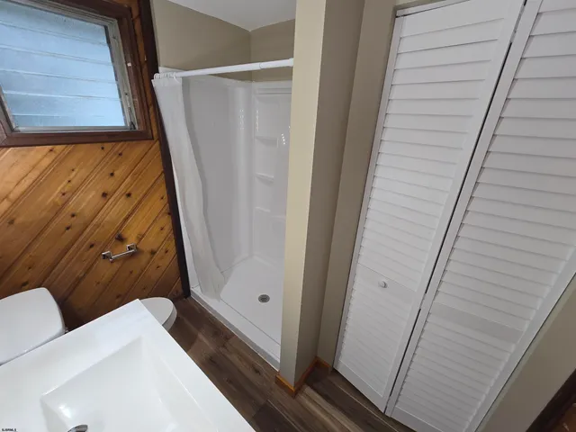 a bathroom with a sink and toilet