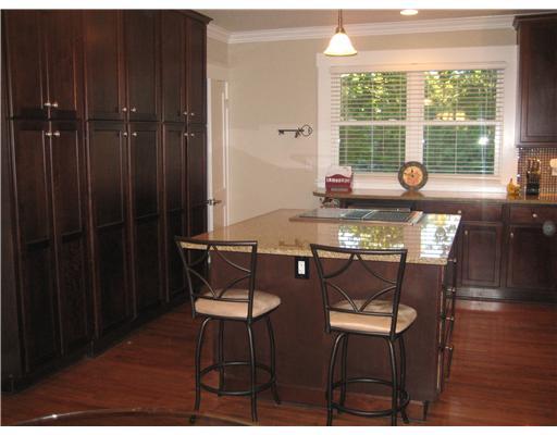 1002 Delafield Road Fox Chapel, PA 15215 - Photo 5 of 18 Kitchen. Cherry cabinetry, abundance of storage and counterspace.Great for entertaining opens to dining area and living area.