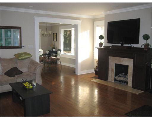 1002 Delafield Road Fox Chapel, PA 15215 - Photo 7 of 18 Living Room. Spacious room with gas log fireplace and mantle framed with 2 large window. High ceilings, recessed lighting, hardwood floors.