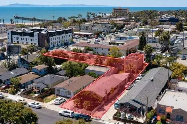 a view of livingroom with furniture wooden floor and a window