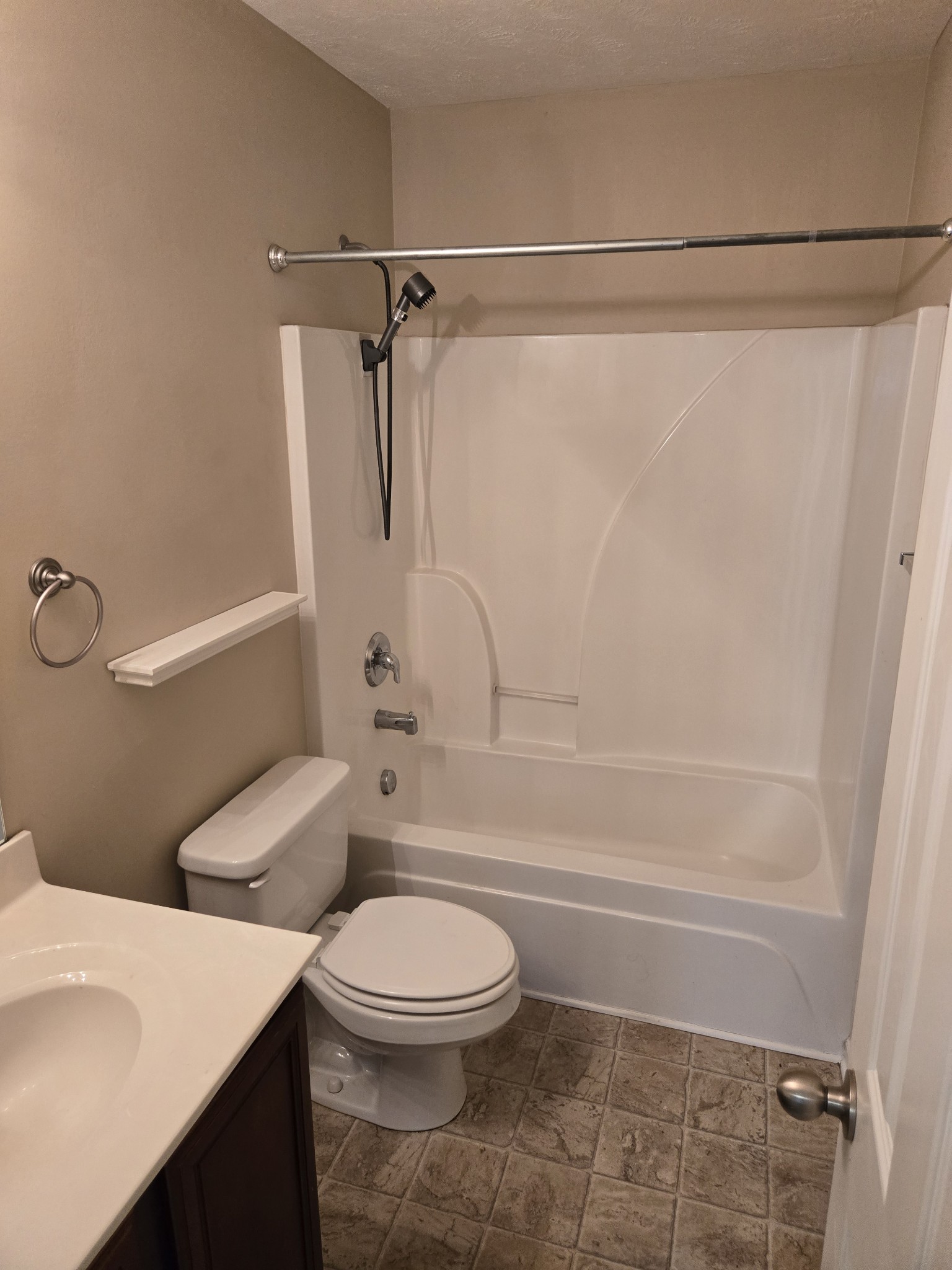 1943 Shaylin Loop, Unit 259 Antioch, TN 37013 - Photo 4 of 9 a bathroom with a toilet and a shower