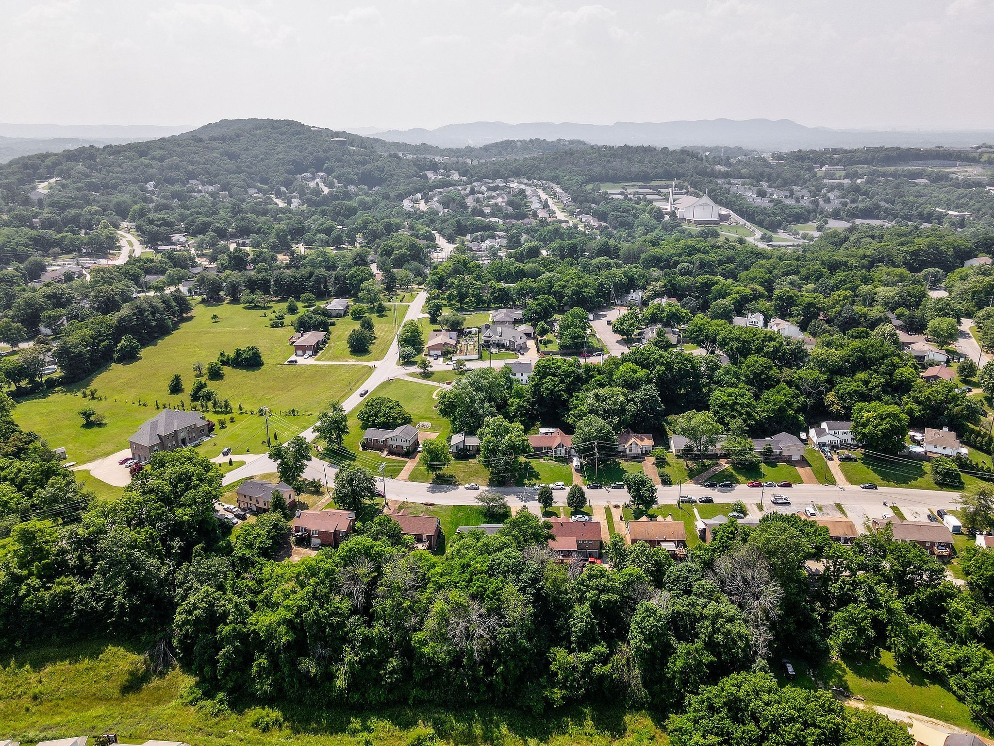 1943 Shaylin Loop, Unit 259 Antioch, TN 37013 - Photo 9 of 9 an aerial view of a city with lots of residential buildings