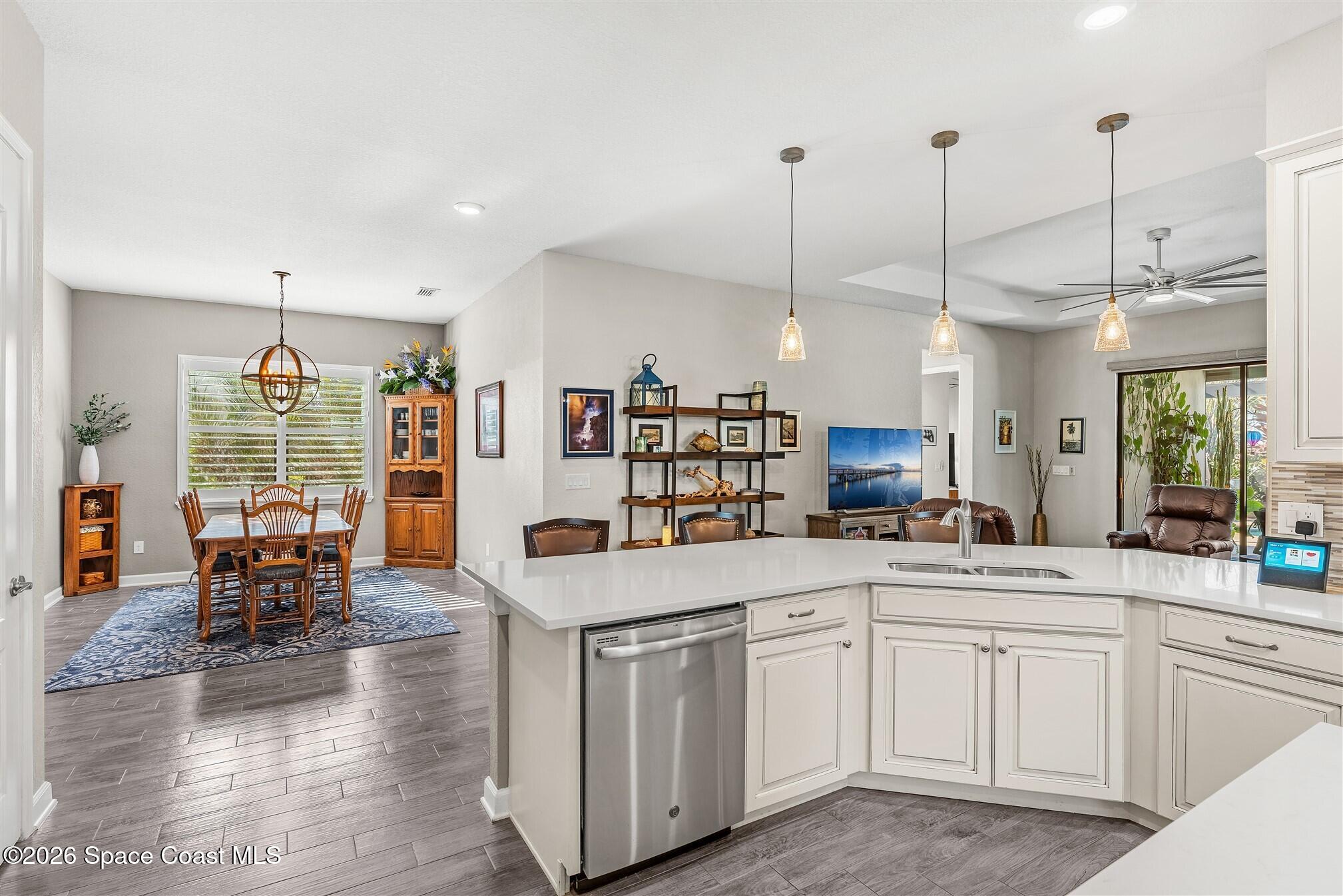 2622 Chapel Bridge Lane Melbourne, FL 32940 - Photo 26 of 92 Kitchen Overlooks Dining Room