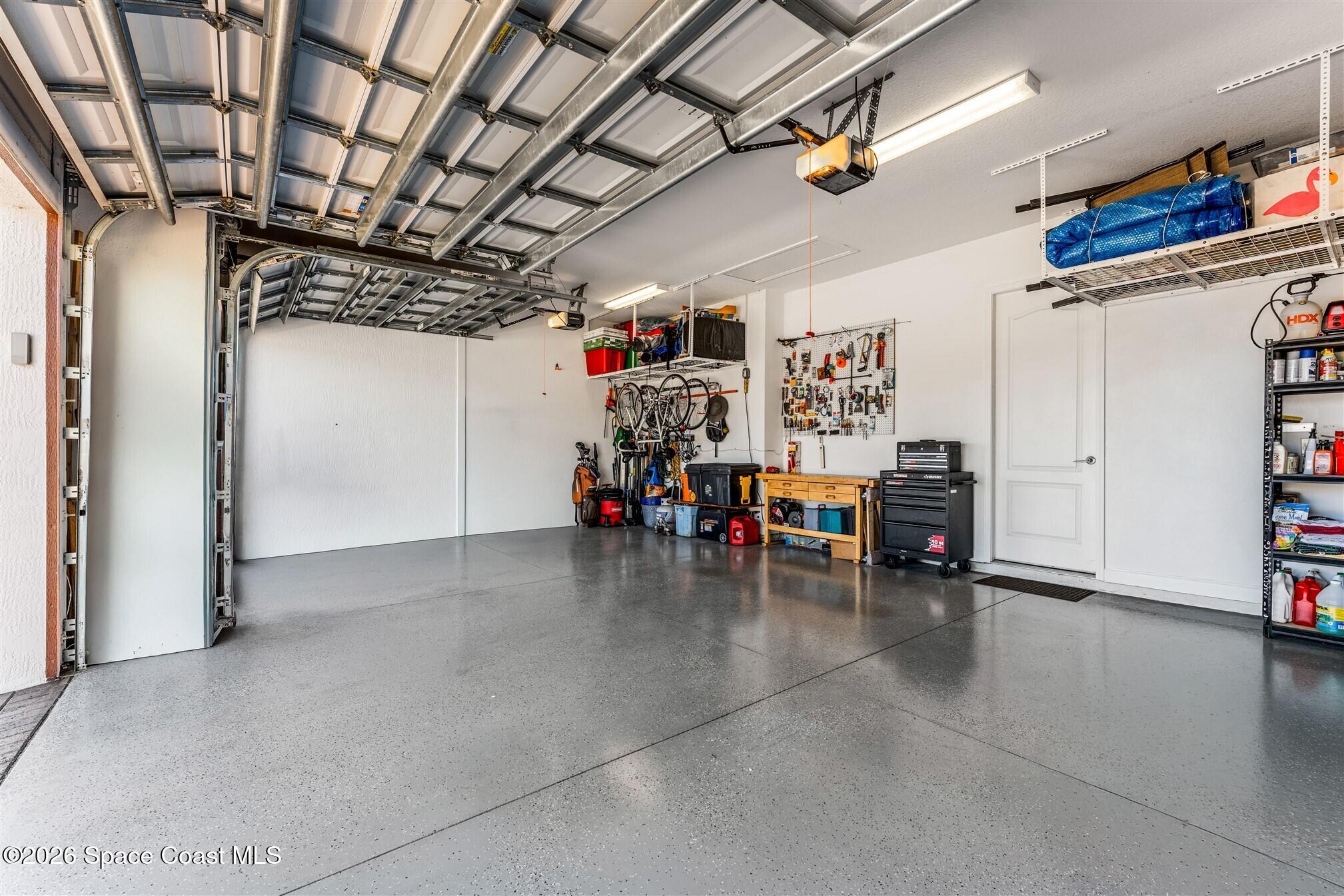 2622 Chapel Bridge Lane Melbourne, FL 32940 - Photo 52 of 92 3 Car Garage with Epoxy Floor