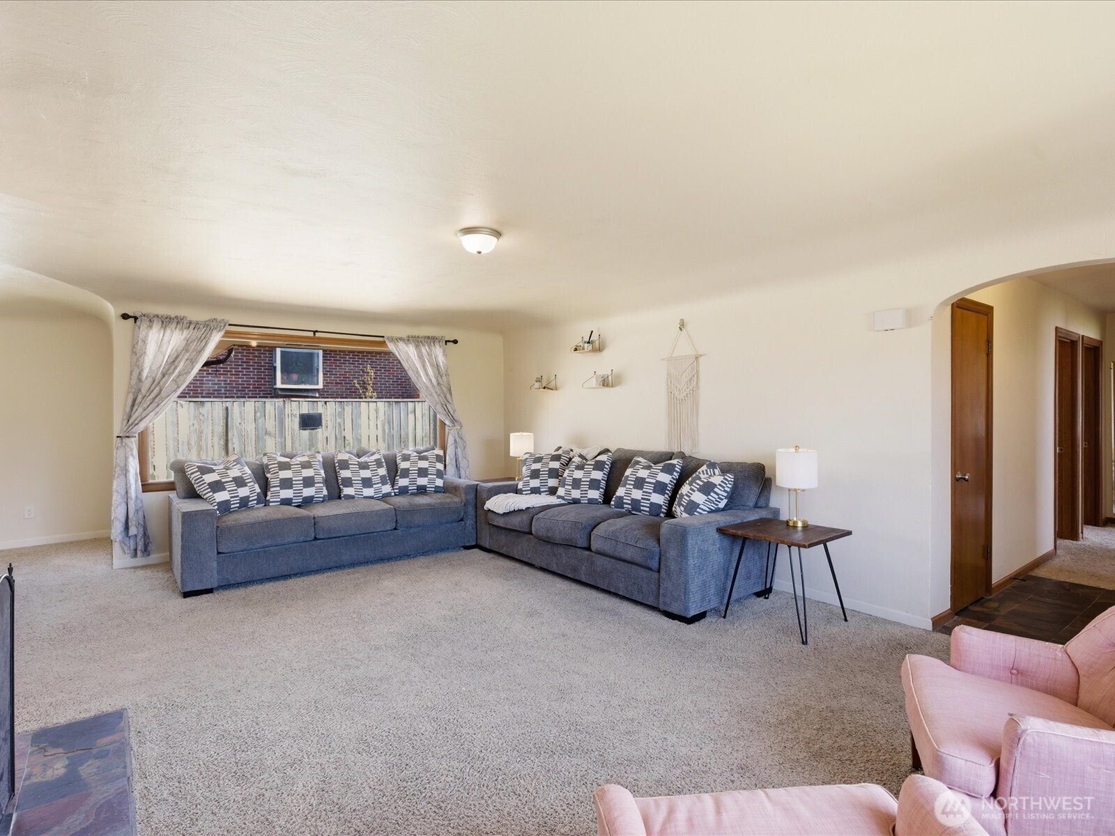 1417 Maple Street Sumner, WA 98390 - Photo 21 of 40 a living room with furniture and a window