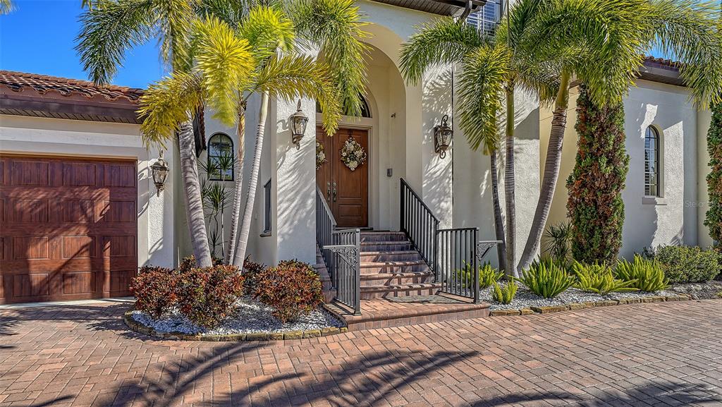 1005 Bogey Lane Longboat Key, FL 34228 - Photo 11 of 69 a view of a house with a street