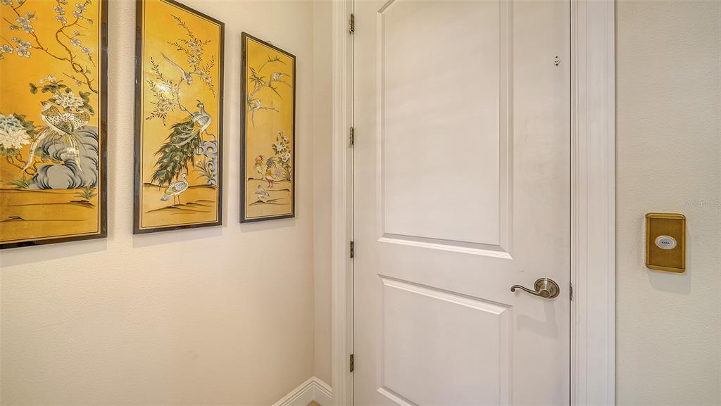 1005 Bogey Lane Longboat Key, FL 34228 - Photo 34 of 69 a view of an entryway with a door