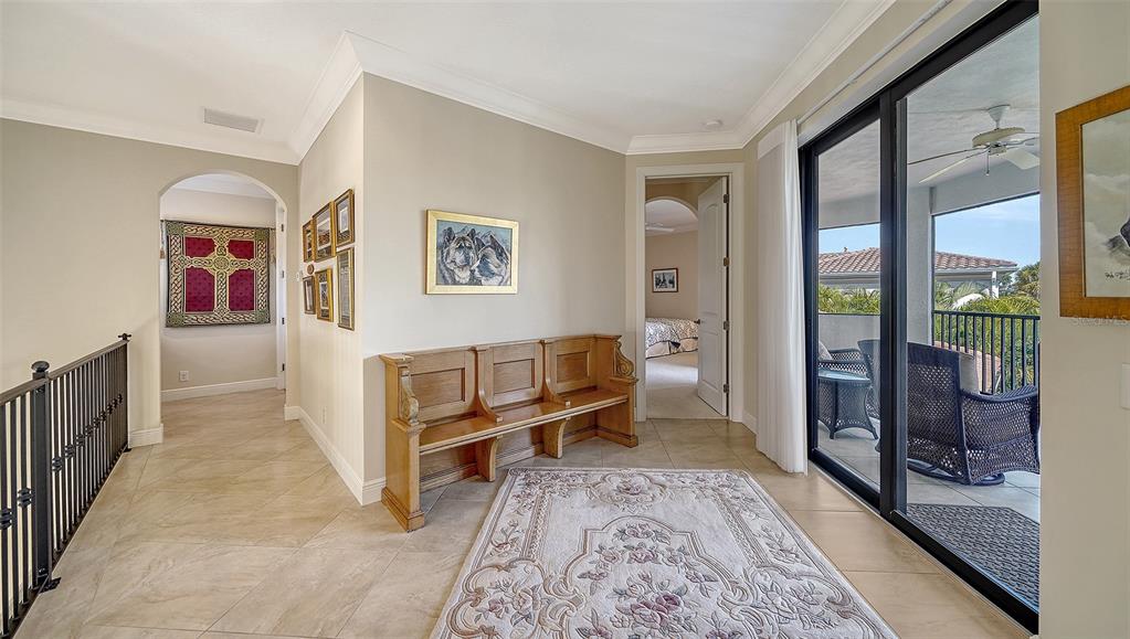 1005 Bogey Lane Longboat Key, FL 34228 - Photo 35 of 69 a living room with furniture and a rug