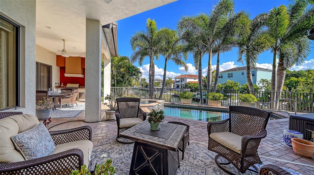 1005 Bogey Lane Longboat Key, FL 34228 - Photo 51 of 69 a building outdoor space with patio furniture