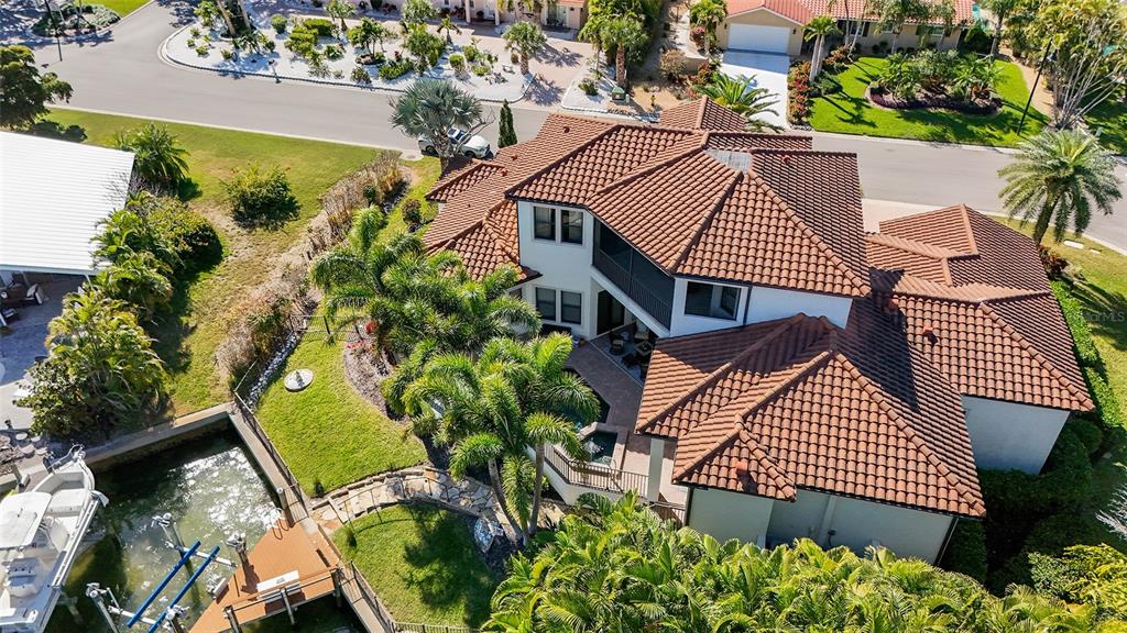 1005 Bogey Lane Longboat Key, FL 34228 - Photo 62 of 69 an aerial view of a house with garden