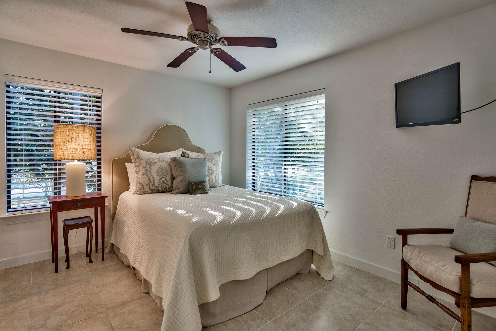 134 My Way Santa Rosa Beach, FL 32459 - Photo 47 of 48 a bedroom with a bed tv and a window