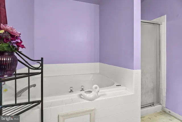 a bathroom with a sink and vanity