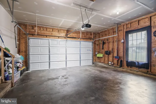 a view of empty room with windows